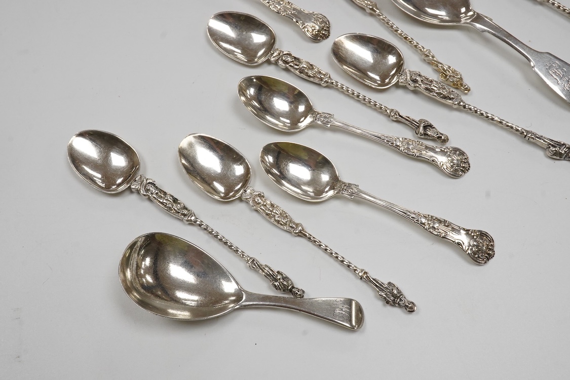 Two 19th century silver caddy spoons including Reid & Sons, Newcastle, 1837, ten assorted silver coffee spoons including apostle and a pair of George V silver sugar nips by William Hutton & Sons, 4.8oz.